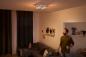 Preview: Philips Hue White Ambiance Buckram 4er Spot in Weiß im Retrostyle mit Dimmschalter