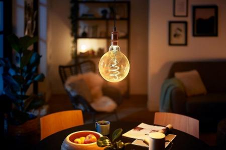 Philips E27 Filament LED Globe Kugel Lampe im vintage Design dimmbar 4W wie 25W 1800K extra warmweißes Licht - Bernstein/Gold